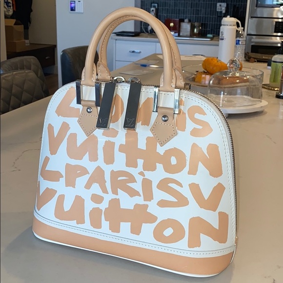 Louis Vuitton Handbags - Louis Vuitton graffiti Alma MM handbag